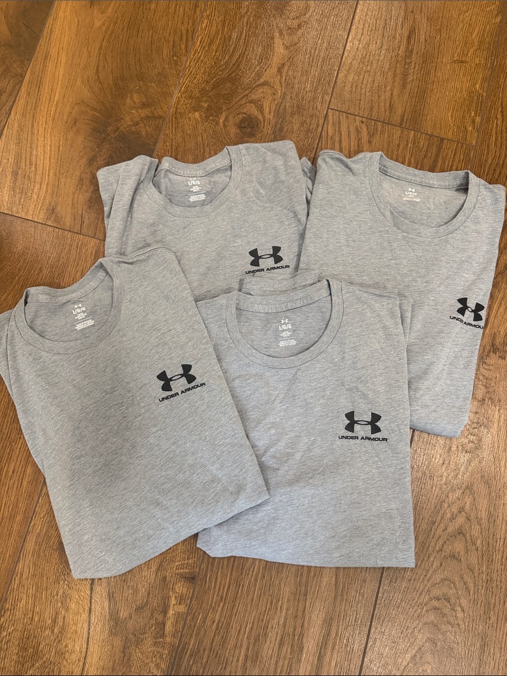 Under Armour Men’s Light Gray Short Sleeve Crewneck Tee Black Logo Size large